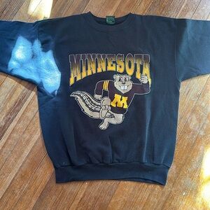 University of Minnesota, black sweatshirt.